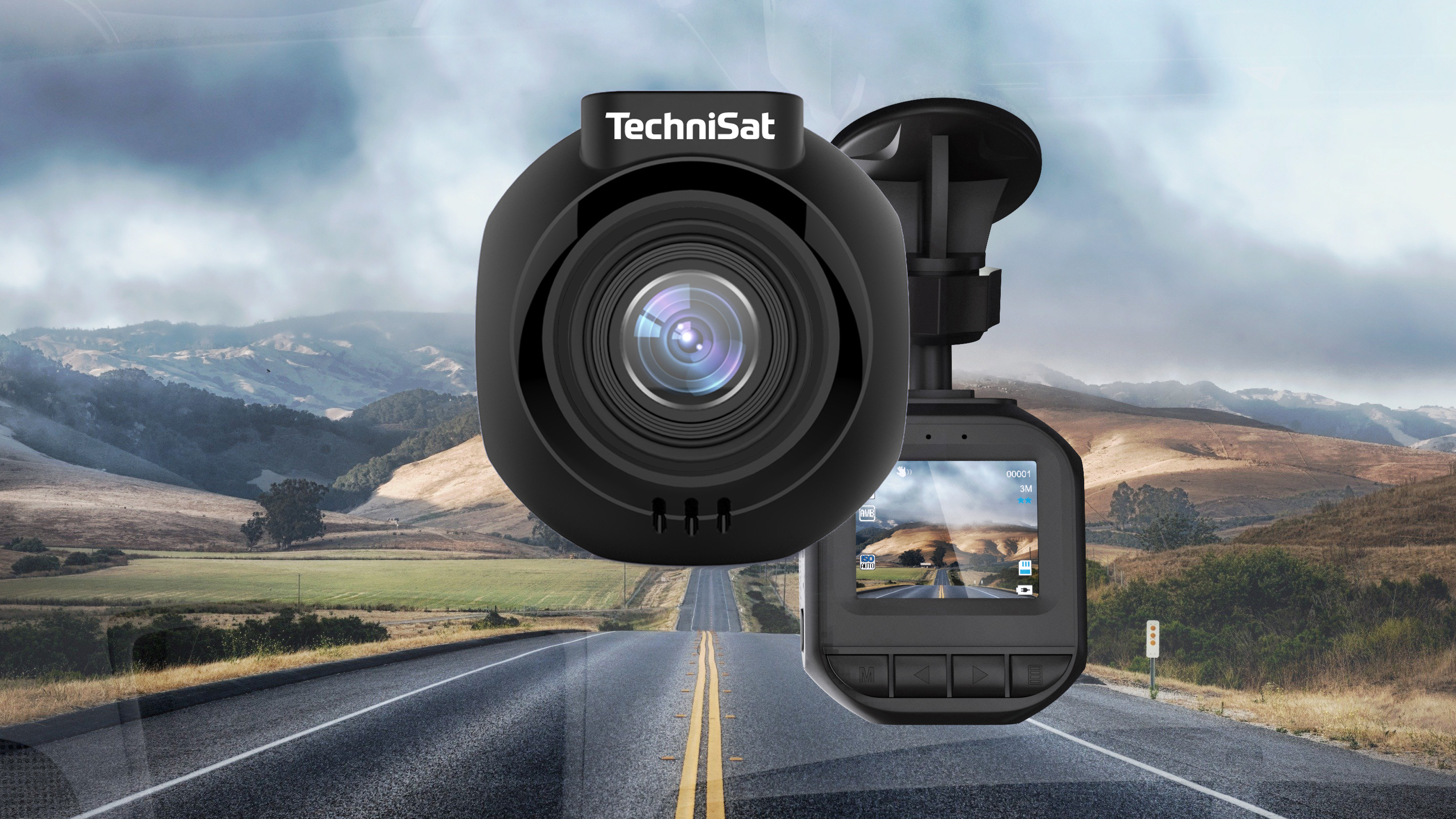 Kamera samochodowa TechniSat ROADCAM 1 CE zamocowana na przedniej szybie, w tle droga.