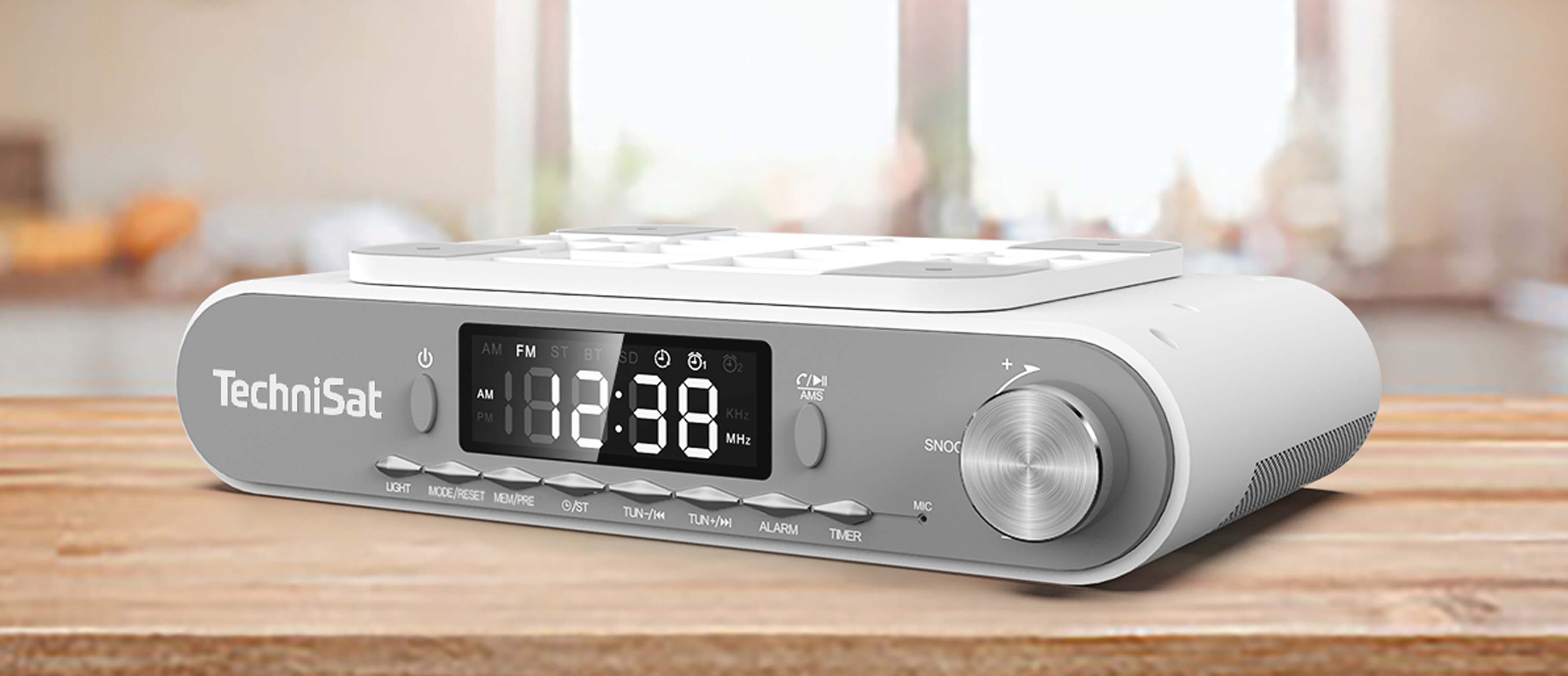 KitchenRadio with a clear, white LED display, standing on a kitchen worktop.